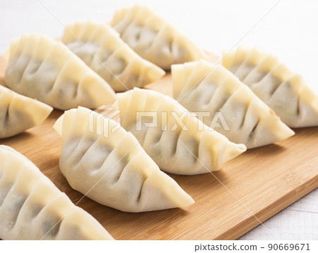 Handmade raw dumplings 90669671