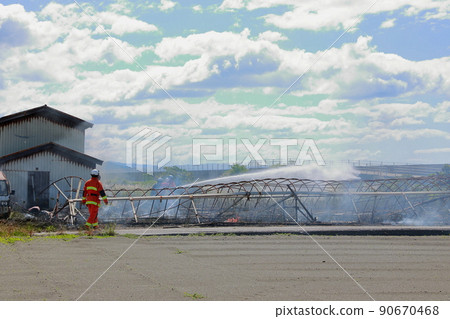 Fire in a greenhouse 90670468