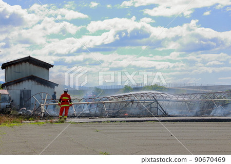 Fire in a greenhouse Fire in a greenhouse 90670469