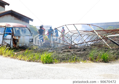 Fire in a greenhouse 90670472