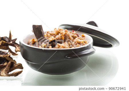 boiled buckwheat with organic forest dried mushrooms in a ceramic bowl 90672941
