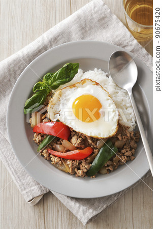 Delicious Gapao rice with fried egg Delicious Gapao rice with fried egg 90675420