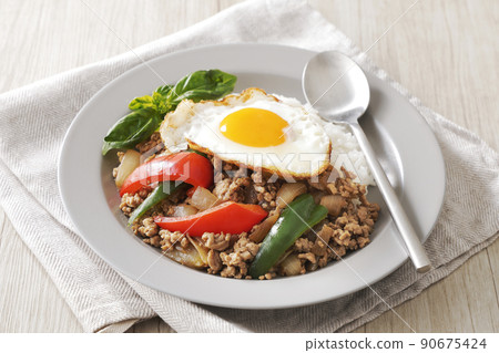 Delicious Gapao rice with fried egg Delicious Gapao rice with fried egg 90675424