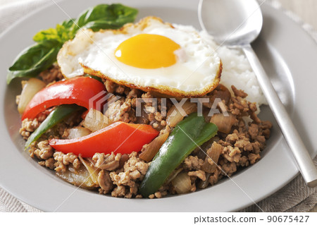 Delicious Gapao rice with fried egg Delicious Gapao rice with fried egg 90675427