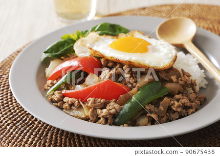 Delicious Gapao rice with fried egg Delicious Gapao rice with fried egg 90675438