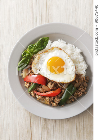 Delicious Gapao rice with fried egg Delicious Gapao rice with fried egg 90675440