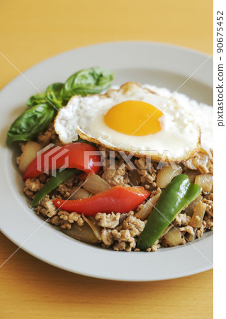 Delicious Gapao rice with fried egg 90675452