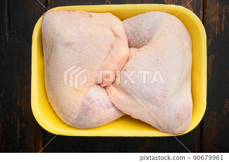 Fresh Chicken Whole Legs, in Foam Tray Pack, on old dark wooden table, top view flat lay Fresh Chicken Whole Legs, in Foam Tray Pack, on old dark wooden table, top view flat lay 90679961