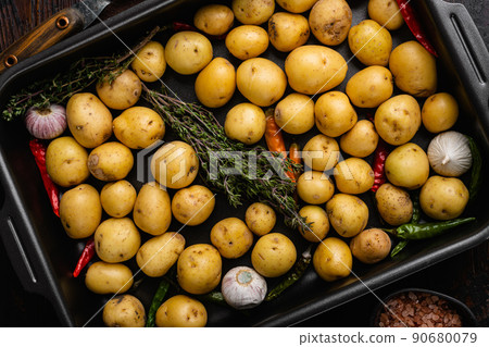 Organic White Baby Potatoes, on old dark  wooden table background, top view flat lay 90680079