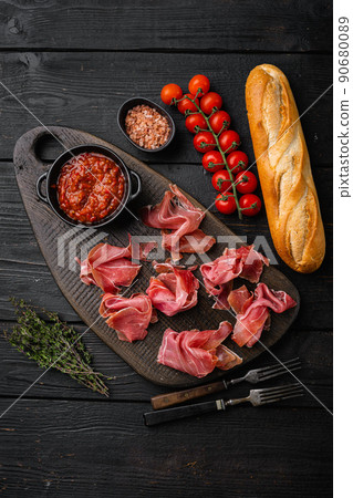 Italian prosciutto crudo or spanish jamon set, on black wooden background, top view flat lay 90680089