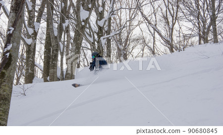 Snowboarder at Hakuba Cortina Ski Resort in Otari Village, Kita Azumino County, Nagano Prefecture Snowboarder at Hakuba Cortina Ski Resort in Otari Village, Kita Azumino County, Nagano Prefecture 90680845