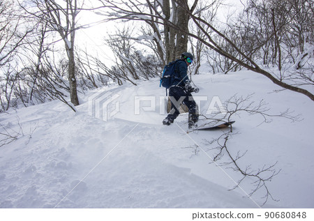 Snowboarder at Hakuba Cortina Ski Resort in Otari Village, Kita Azumino County, Nagano Prefecture Snowboarder at Hakuba Cortina Ski Resort in Otari Village, Kita Azumino County, Nagano Prefecture 90680848
