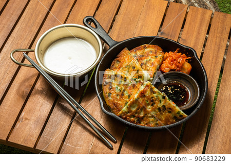 Chijimi Korean gourmet Asian Okonomiyaki jijim and iron pan Korean food 90683229