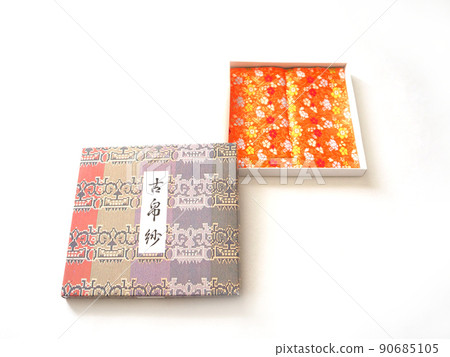 Old cloth in a paper box Old cloth in a paper box 90685105