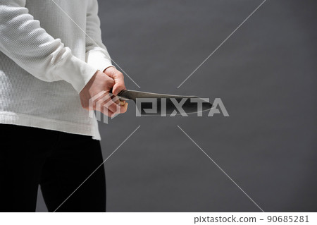 A woman who also has a kitchen knife A woman who also has a kitchen knife 90685281