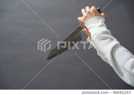 A woman who also has a kitchen knife A woman who also has a kitchen knife 90685283