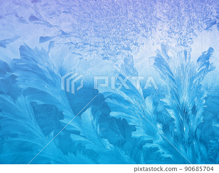 Beautiful ice pattern and sunlight on window 90685704