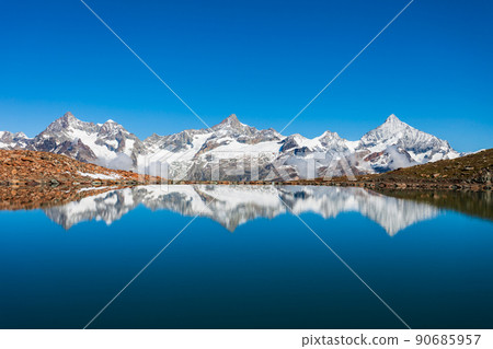 Riffelsee lake and Matterhorn, Switzerland 90685957