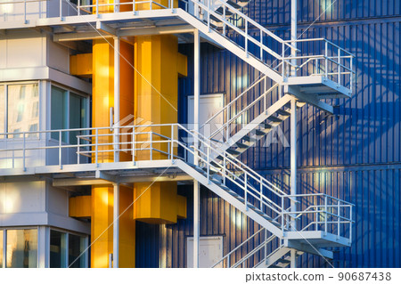 A staircase in a factory. Industrial photography for the background. Manufacturing and manufactory. A staircase in a factory. Industrial photography for the background. Manufacturing and manufactory. 90687438