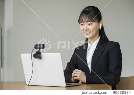 Online interview web conference image Young woman in a suit Online interview web conference image Young woman in a suit 90688884