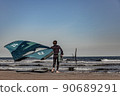 wing foil old kiter on the beach 90689291
