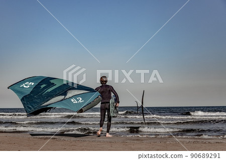 wing foil old kiter on the beach 90689291