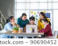 Happy Asian business people work together in office, creative team brainstorm meeting 90690452