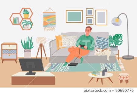 Man playing video game. Boy sitting on sofa with cat playing console at home. Male character holding joystick Man playing video game. Boy sitting on sofa with cat playing console at home. Male character holding joystick 90690776
