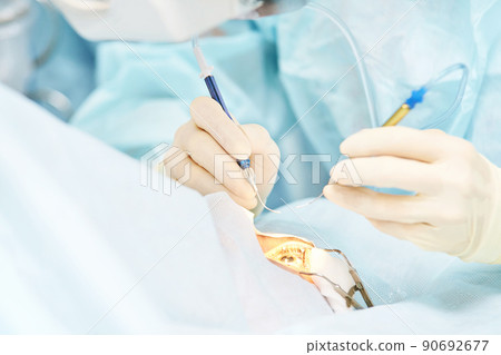 Ophthalmology laser microscope operation. Doctor in clinic. Patient treatment 90692677