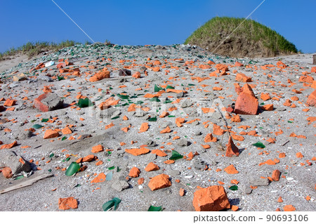 beach with shards of glass and brick beach with shards of glass and brick 90693106