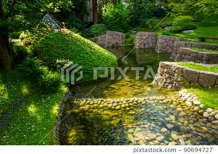 Stream  and some  pond in japanese  garden in Albert Kahn park 90694727