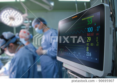 Heart rate and patient condition control monitor in hospital theater room during surgery operation 90695907