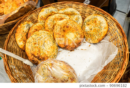 Appetizing flat breads with sesame seeds from the tandir Appetizing flat breads with sesame seeds from the tandir 90696182