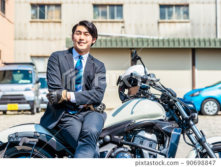 Office worker commuting by motorcycle Tokyo Office worker commuting by motorcycle Tokyo 90698847
