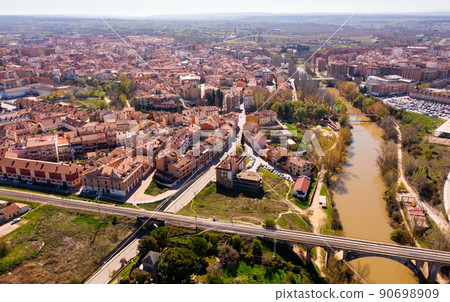 Drone view of Aranda de Duero cityscape on river banks Drone view of Aranda de Duero cityscape on river banks 90698909