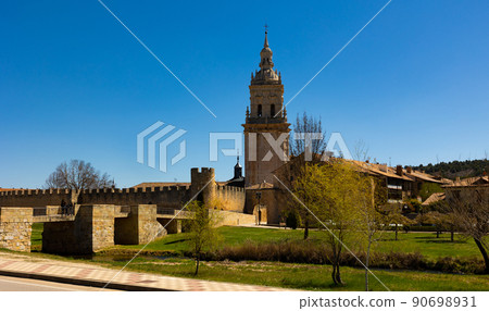 Burgo de Osma Cathedral, landscape under blue sky Burgo de Osma Cathedral, landscape under blue sky 90698931