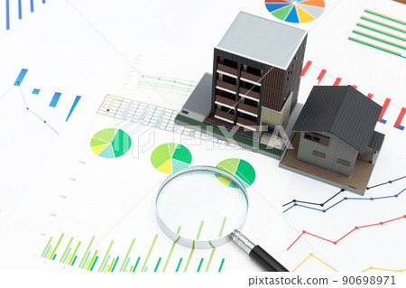 House model, graph and magnifying glass 90698971