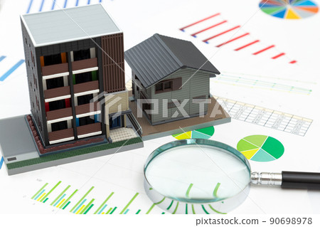 House model, graph and magnifying glass 90698978