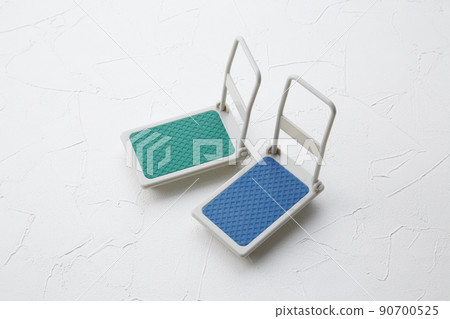 A cute miniature push cart that can be used for the image of logistics and moving A cute miniature push cart that can be used for the image of logistics and moving 90700525