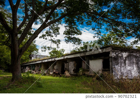 Remains of the destroyed San Lorenzo Hospital of the Armero Town buried by the avalanche up to the second floor after 37 years of the tragedy caused by the Nevado del Ruiz Volcano in 1985 90702321