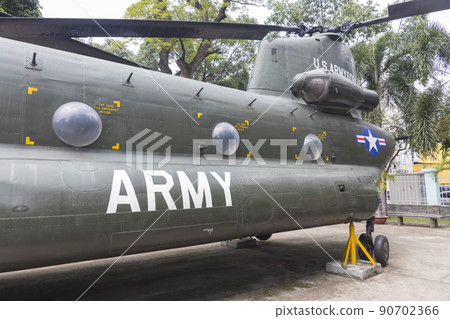 Ho Chi Minh, Vietnam - Oct 17, 2019 : Old tank and helicopter Chinookof United state army display at Vietnamese - American War Remnants Museum in Ho Chi Minh City, Vietnam on Oct 17, 2019. Ho Chi Minh, Vietnam - Oct 17, 2019 : Old tank and helicopter Chinookof United state army display at Vietnamese - American War Remnants Museum in Ho Chi Minh City, Vietnam on Oct 17, 2019. 90702366