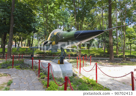 Ho Chi Minh, Vietnam - Oct 17, 2019 : Northrop F-5E Tiger fighter jet of the South Vietnamese Army displayed outside of the Reunification Palace in Ho Chi Minh City, Vietnam on Oct 17, 2019. 90702413