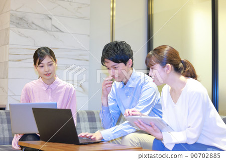 An engineer who thinks with a serious expression An engineer who thinks with a serious expression 90702885
