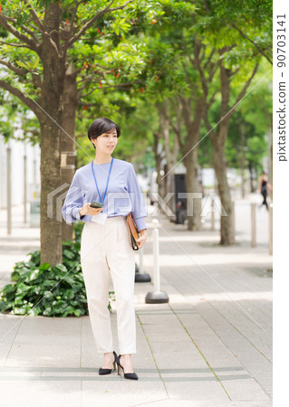 Business working woman outdoors Business working woman outdoors 90703141