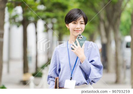 Business working woman outdoors 90703259