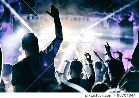 Concert crowd applauding Concert crowd applauding 90704044