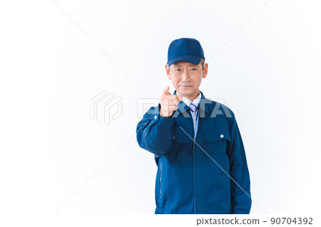 On-site worker pointing and confirming On-site worker pointing and confirming 90704392