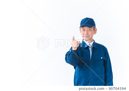 On-site worker pointing and confirming On-site worker pointing and confirming 90704394