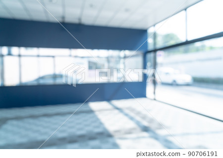 abstract blur empty office with glass window and sunlight abstract blur empty office with glass window and sunlight 90706191