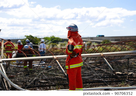 Fire in a greenhouse 90706352
